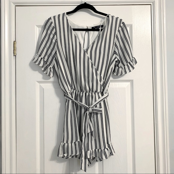 White and black striped shorts romper with ruffle detail - Picture 2 of 12